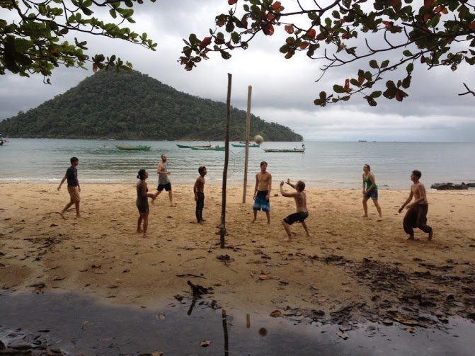playing volleyball at the beach with new friends playing volleyball at the beach with new friends