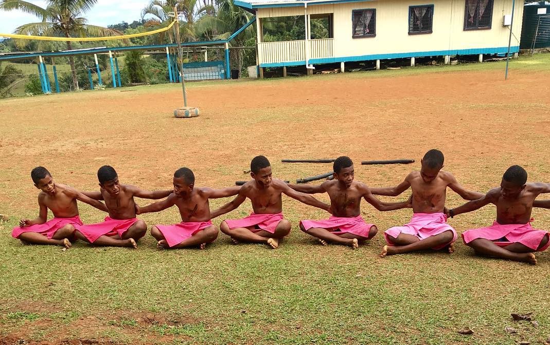 Fijian ceremony in public school with traditional sulu