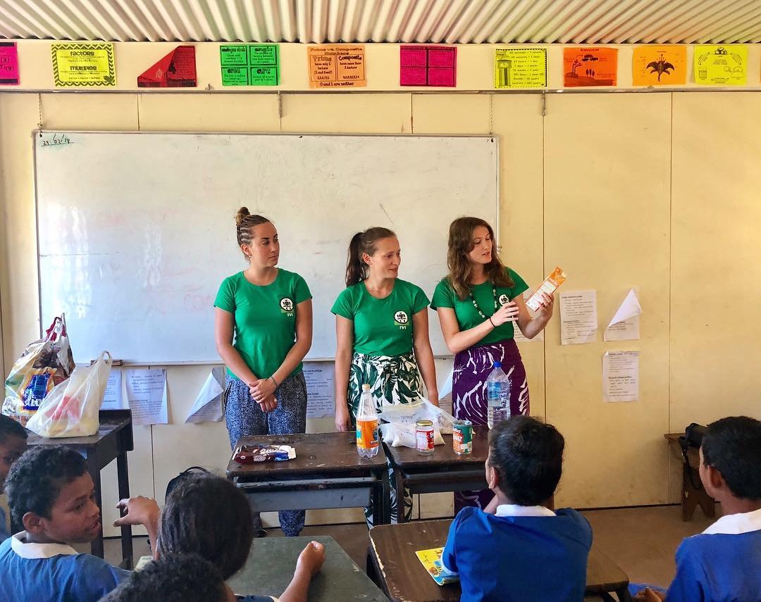 Holly and the volunteers teaching fijian kids about nutrition and diet - IVI Making progress in Fiji & Vanuatu!