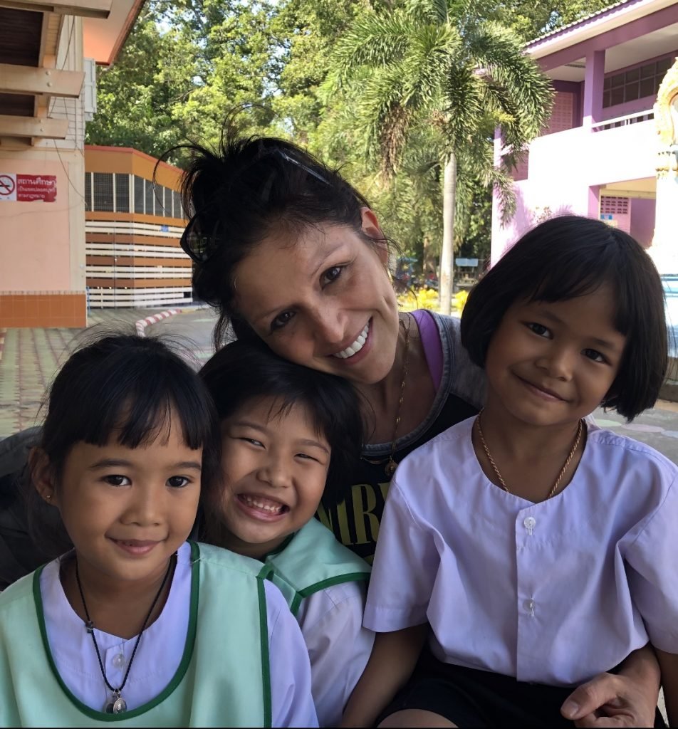 lucy with some thai children on placement in Singburi 952x1024 - English Teaching Thailand