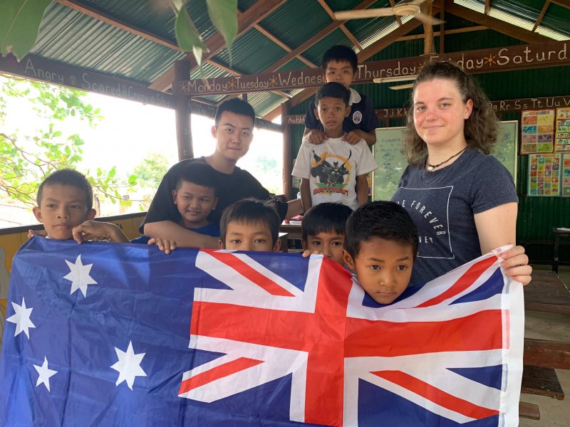 joydyn with kids in cambodia and australia flag 800x600 - Rural Primary School Cambodia