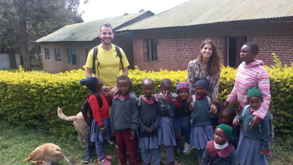 volunteers with Tanzanian students