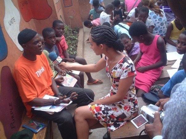 Participant interviewing local man Participant interviewing local man