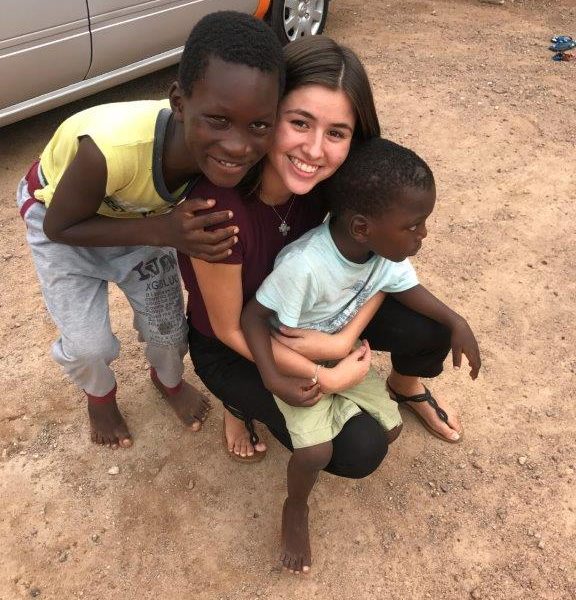 holding children on Ghana project