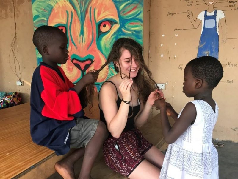 Children braiding girls hair Children braiding girls hair