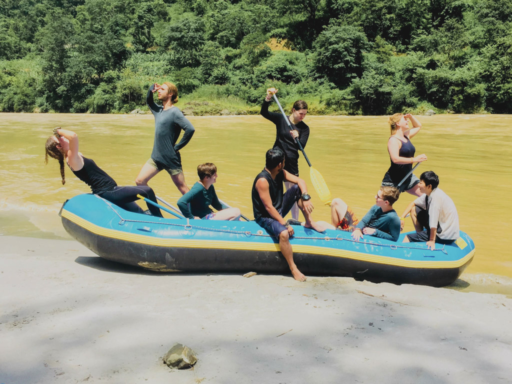 group in inflatable boat by river - Kindergarten Teaching Pokhara, Nepal