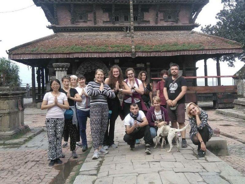 group pic by temple in Nepal 800x600 - Nepal