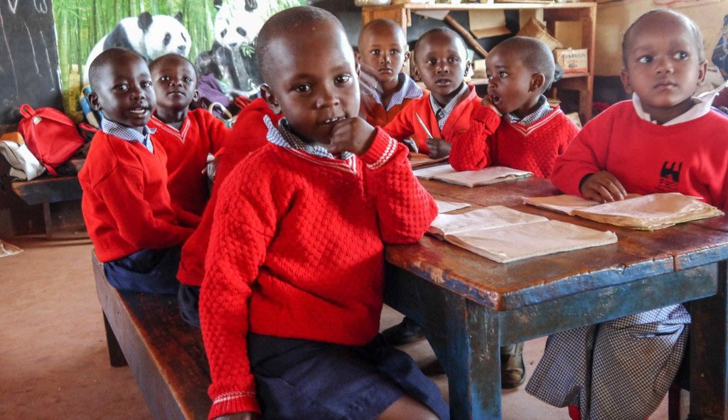 kindergarten students at their desk 2 - Kindergarten Review in Kenya