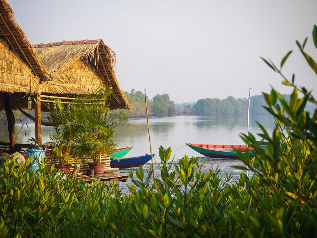 Mangrove Environmental Conservation Program Cambodia straw huts by river in Cambodia 1024x768 - Mangrove Environmental Conservation Program Cambodia