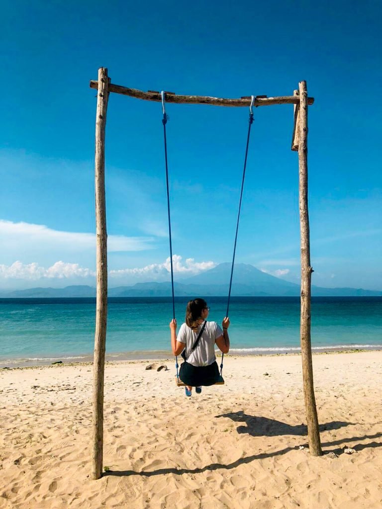 swing on beautiful beach 768x1024 - My Experience in Bali