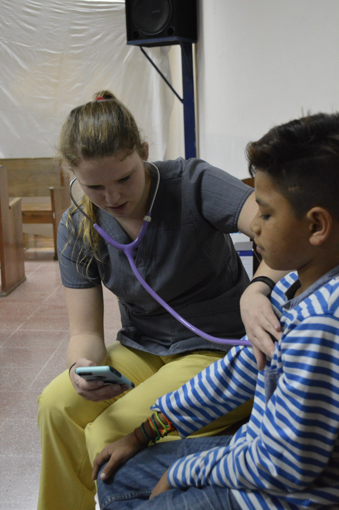 checking childs heartbeat - Medical Volunteering Costa Rica