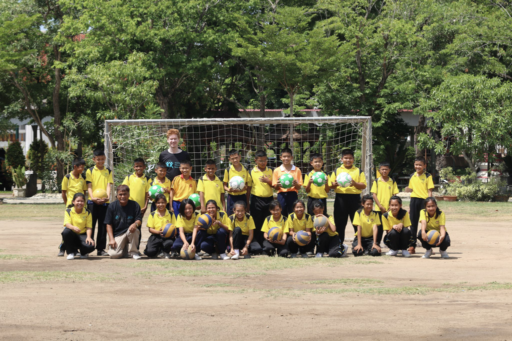 Group photo of coach with students 2 - Sports Coaching Thailand