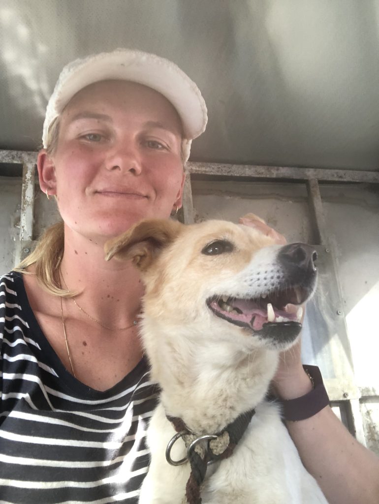 volunteer with dog in nepal 770x1024 - Testimonials