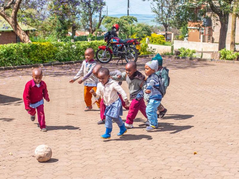 Students playing football during break time 10  800x600 - Childcare Support in Stone Town, Zanzibar