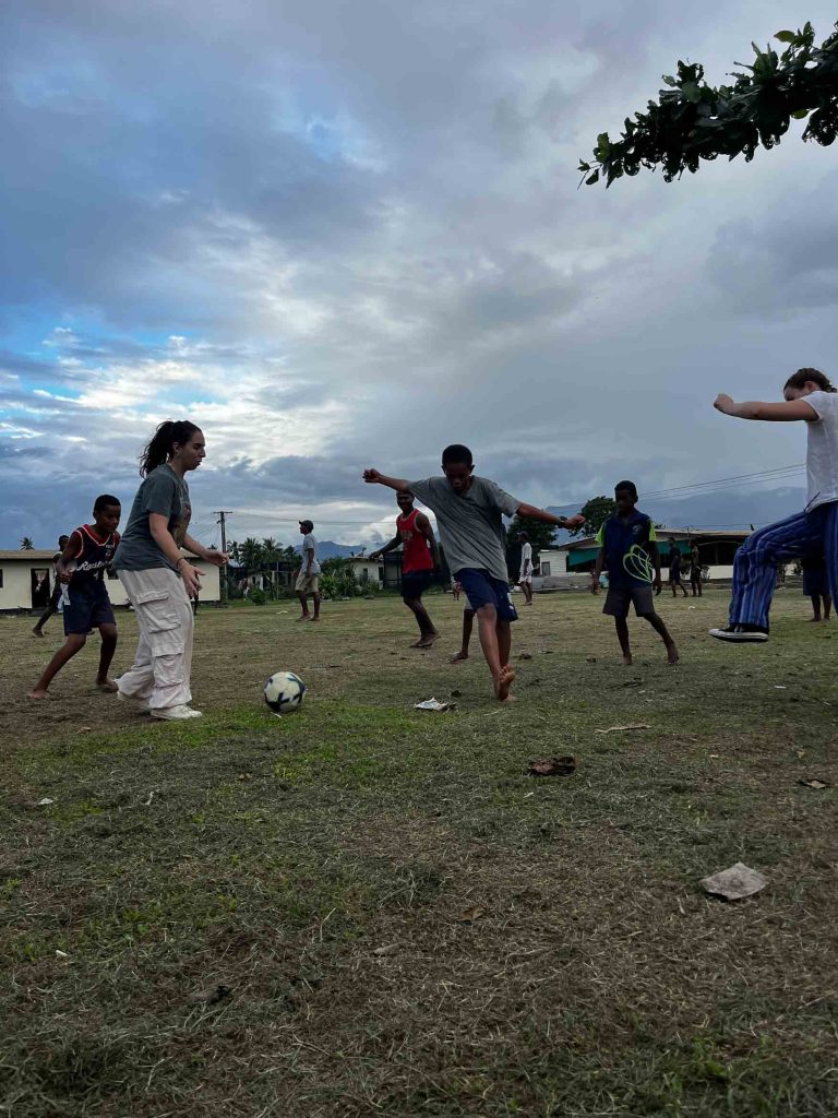 playing football 768x1024 - Women & Children's Commune Review - Fiji