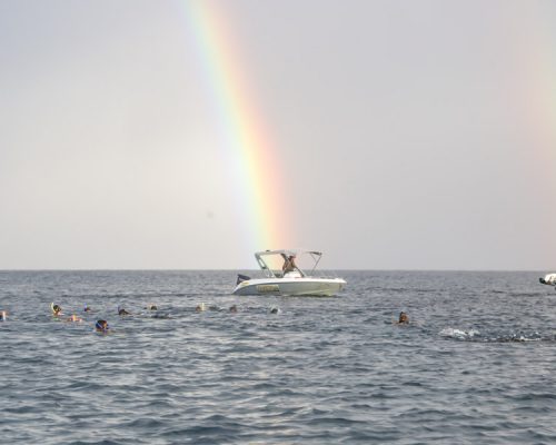 rainbow over boat