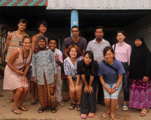 Group photo of participants with locals Group photo of participants with locals