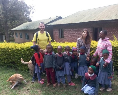 volunteers with Tanzanian students