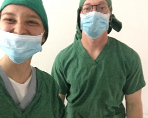 volunteer selfie in scrubs on Tanzania medical project