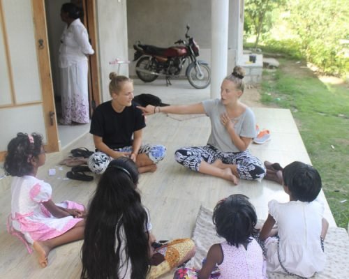 sitting with small group of kids sitting with small group of kids