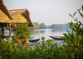 straw huts by river in Cambodia oj9217f6jbuap7i8drp8775a6l9bc6dtz66njf03lw - Mangrove Environmental Conservation Program