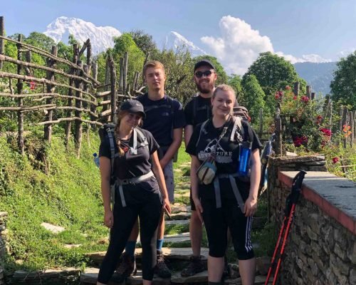 4 Week Annapurna Trek and Volunteering volunteer pic with mountian backdrop scaled pwra674q8o674f81q9ib7o02o1xgdf47o4uvjd55ls - 4 Week Annapurna Trek and Volunteering